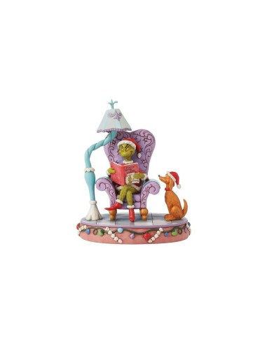 Il Grinch che legge sulla sedia Jim Shore