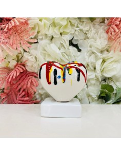 Scultura cuore piccolo imbrattato