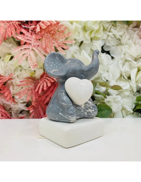 Statua Elefantino con cuore e schizzi