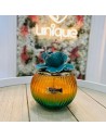 Candela sfera in vetro ambra e blu con fiore Pienne Design
