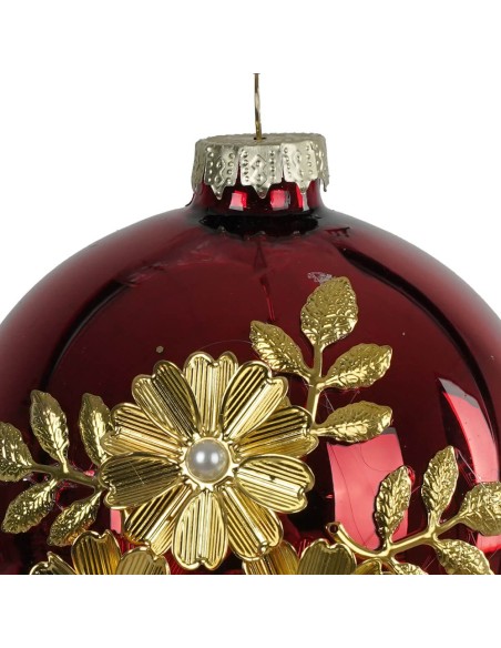 Sfera natalizia rossa con fiori dorati